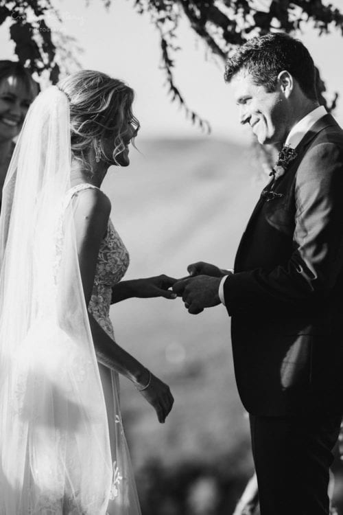 Real Weddings | Vinka Design | Real Brides Wearing Vinka Gowns | Helena and Tim black and white outdoor ring on finger