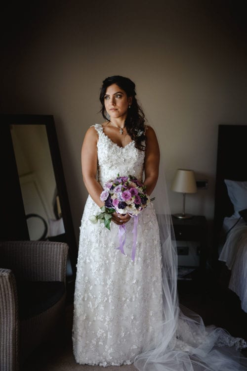 Real Weddings | Vinka Design | Real Brides Wearing Vinka Gowns | Ayesha and Nick - Ayesha indoors wearing gorgeous beaded floral lace, which fitted her to perfection.