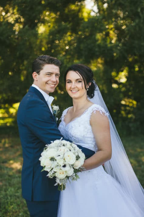 Real Weddings | Vinka Design | Real Brides Wearing Vinka Gowns | Kat and Logan - portrait with Kat wearing bespoke wedding dress with lace bodice