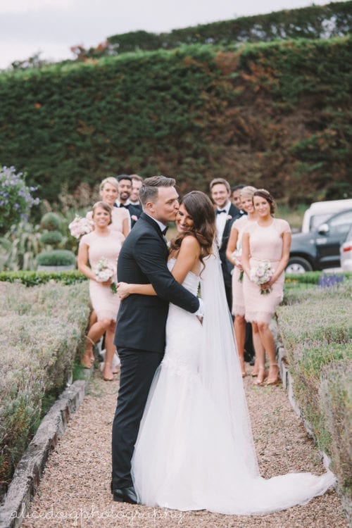 Real Weddings | Vinka Design | Real Brides Wearing Vinka Gowns | Gemma and Colin with bridal party behind