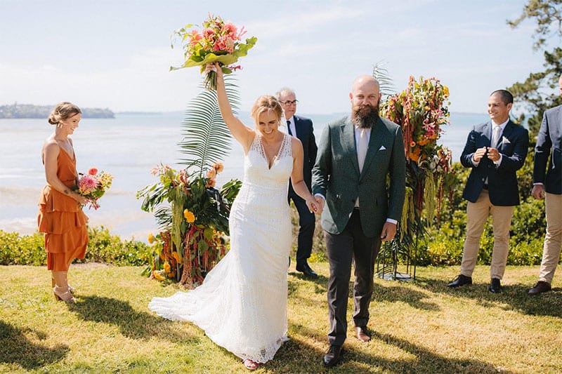 Testimonials | Vinka Design | Real Bridal Reviews from Our Clients | Kristin and husband just married on cliff top