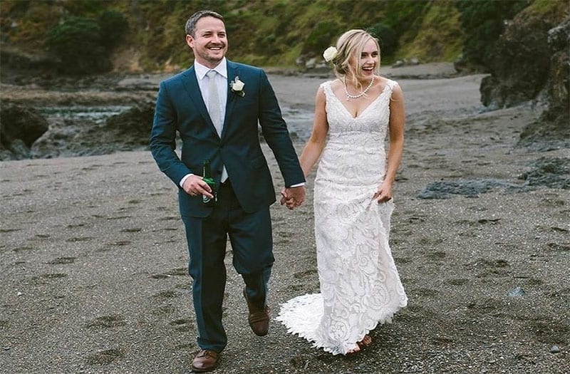 Testimonials | Vinka Design | Real Bridal Reviews from Our Clients | Rebecca and husband walk along beach