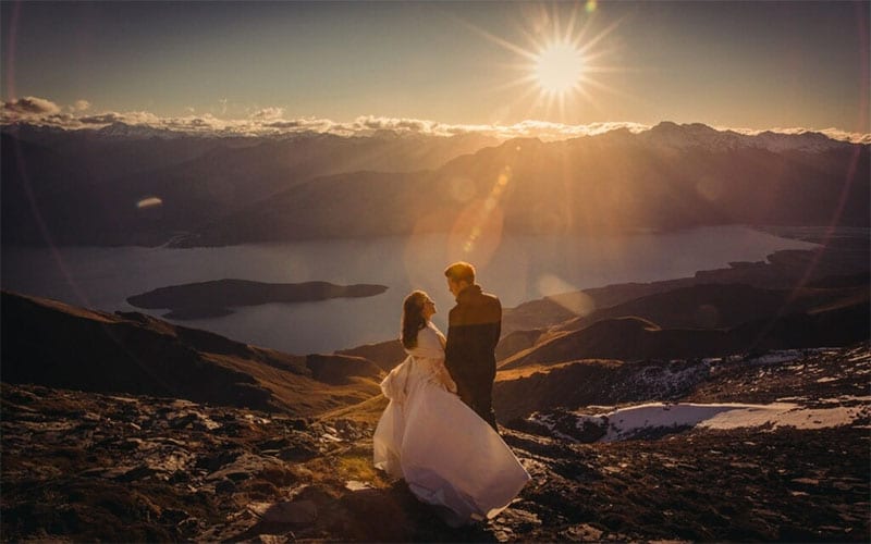 Testimonials | Vinka Design | Real Bridal Reviews from Our Clients | Sara and Ben atop a mountain in Queenstown