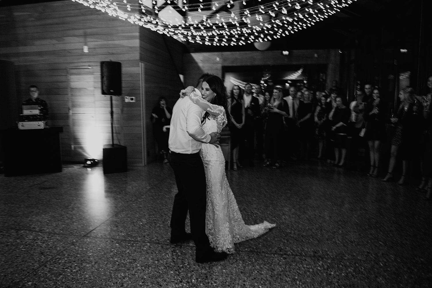 Vinka Design Features Real Weddings - Bride in custom made gown first dance with groom in black and white