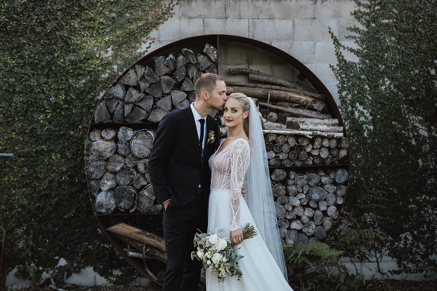 Vinka Design Features Real Weddings - custom gown with fitted bodice. bride and groom