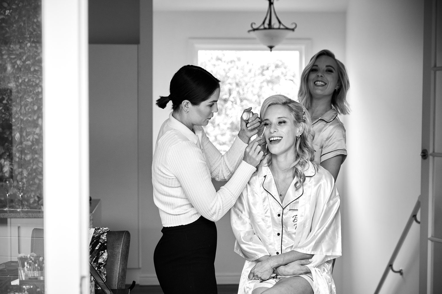 Emma and Marty - bride getting makeup done