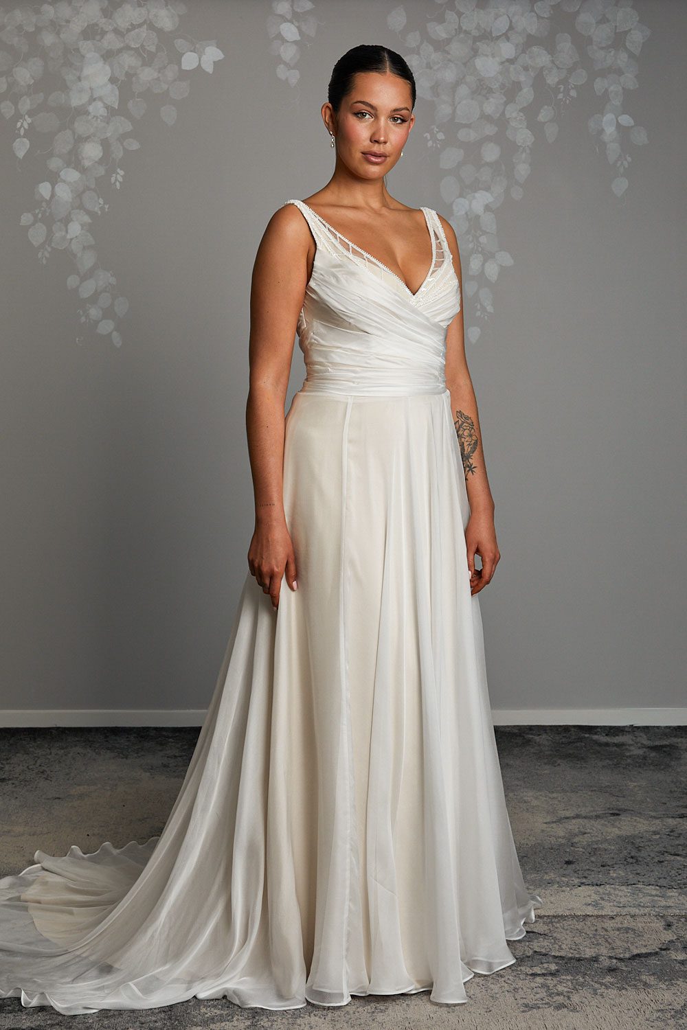 Tihana - Dreamy silk chiffon and intricately beaded, lined lace wedding gown from the Curve collection. A-Line, Beaded, Silk Chiffon, V-Neck. Vinka Design, NZ